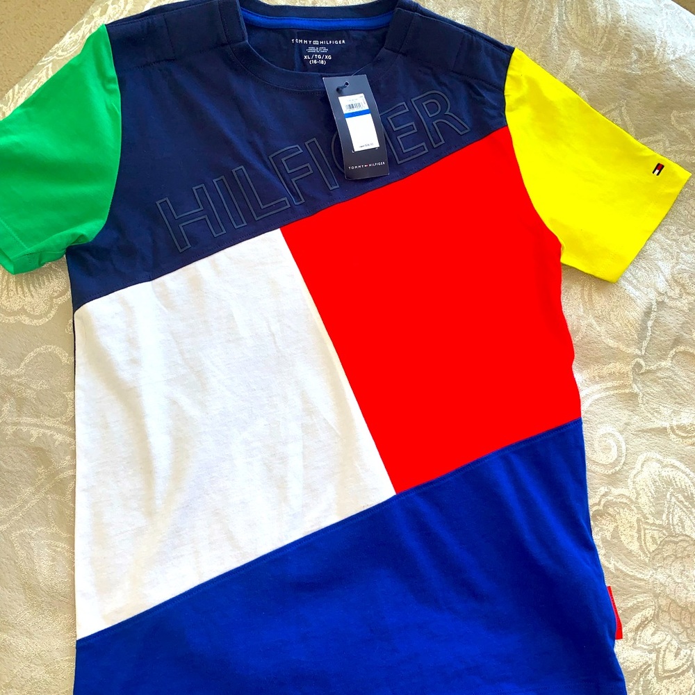 Brand new with tags original Tommy Hilfiger shirt. Boys size 16/18 (fits as 14)